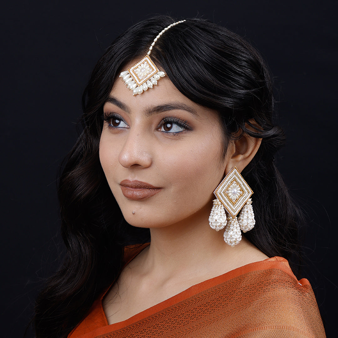 VANI SET  ( EARRINGS, TIKKA, PAIR OF BANGLES )
